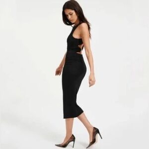 Good American Plunged Back Strap Midi Dress
Black size 3